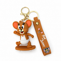 Brown cartoon mouse skateboard keychain with brown wrist strap and gold-tone hardware