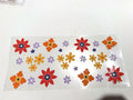 Retro Rainbow Flowers UV DTF transfer sheet, upright view
