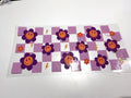 Purple Smiley Flowers & Checkerboard UV DTF transfer sheet, upright view