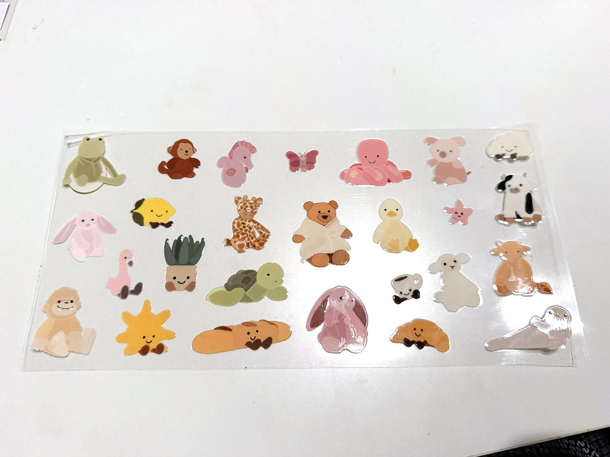 Cute Animals & Smiling Mini Motifs UV DTF transfer sheet, upright view