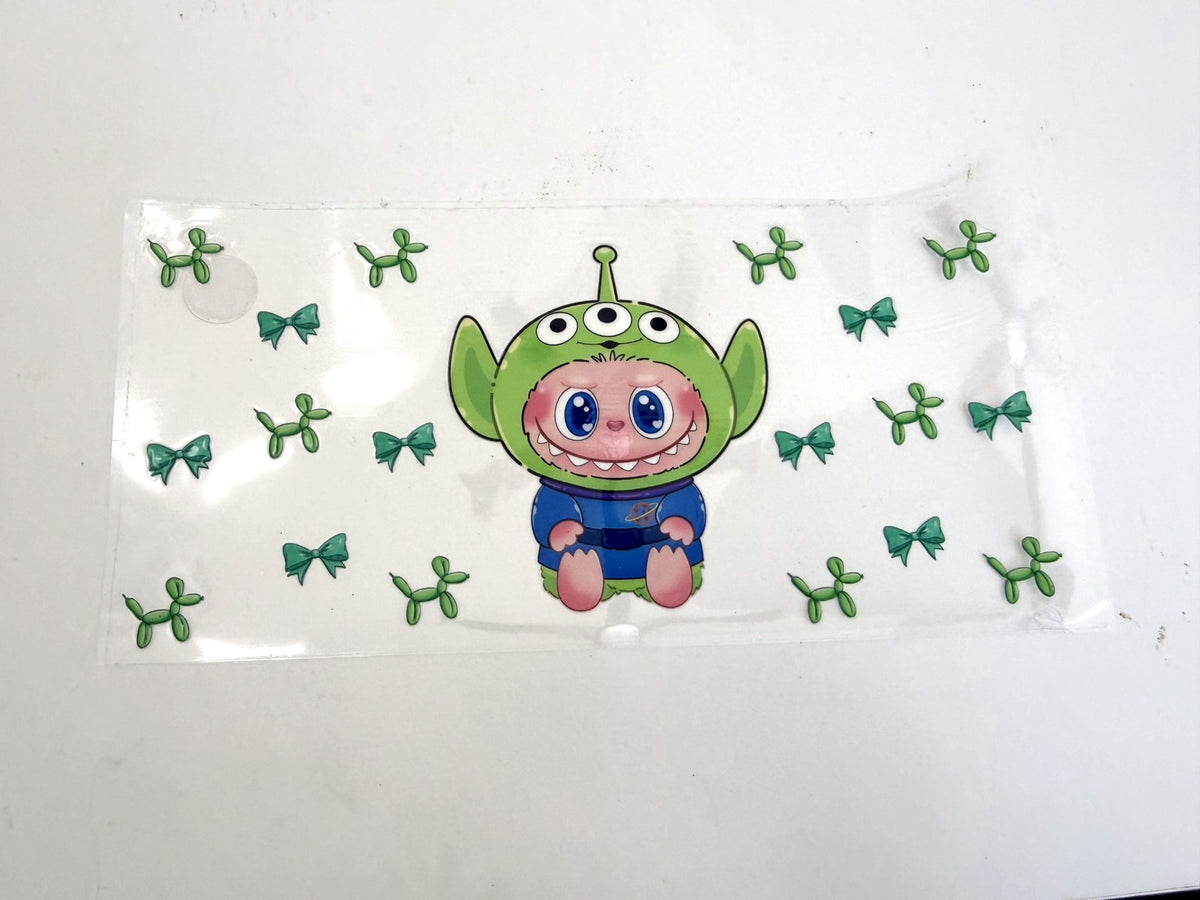 Three-Eyed Alien Doll, Green Bows & Balloon Dogs UV DTF transfer sheet